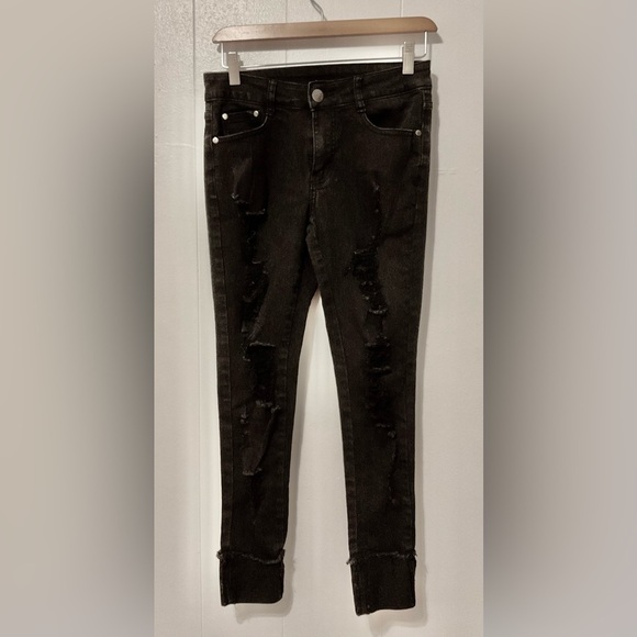 Black Distressed Skinny Jeans
Size 7/8 - Picture 1 of 5
